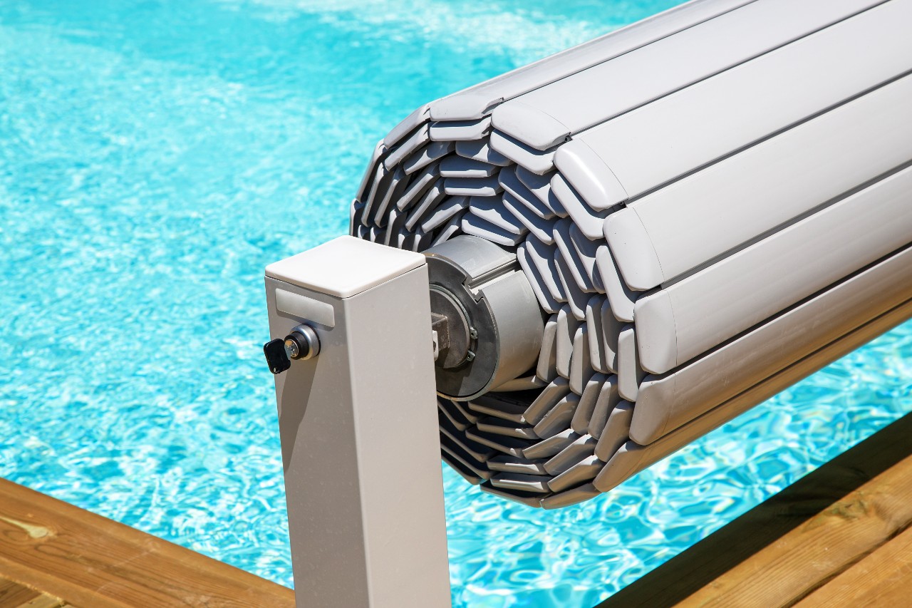 pvc pool shutter to conserve heat and protect from accidental falls